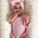 Personalizable Asteria Ruffle Romper in Petal Pink