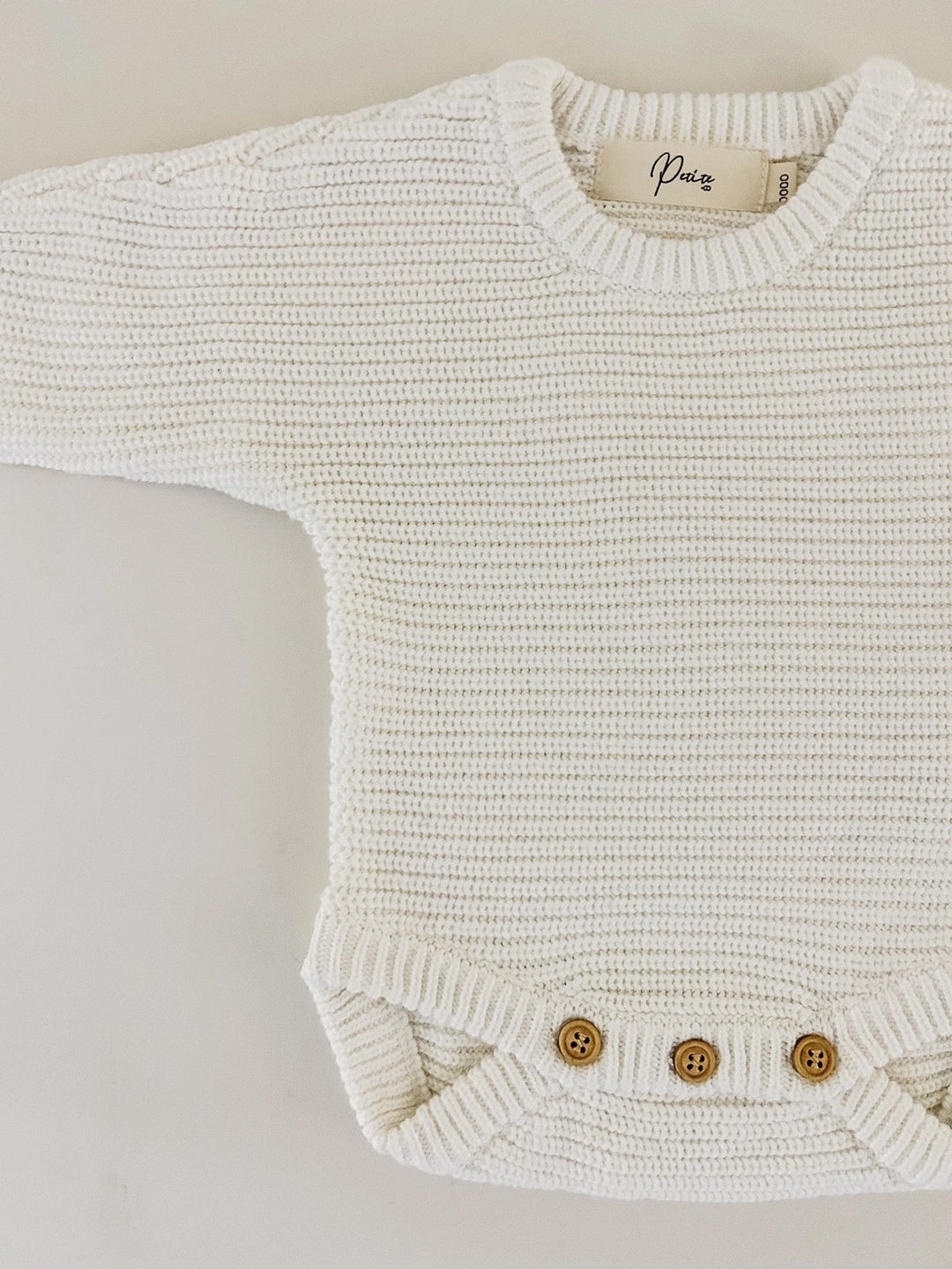 Chunky Knit Ribbed Romper in Milk